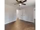 Comfortable bedroom featuring modern laminate floors and closet storage at 519 N State St, Lincolnton, NC 28092