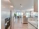 Modern kitchen seamlessly connects to the living area with stainless steel appliances and granite countertops at 574 Altamonte Dr, Clover, SC 29710