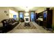 Comfortable living room features a fireplace and large windows with lots of natural light at 5834 Coopers Ridge Ln, Charlotte, NC 28269