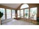 Inviting sunroom with natural light and space to relax at 5834 Coopers Ridge Ln, Charlotte, NC 28269