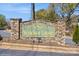 Stone entrance sign for Windsor Grove community under a clear sky at 6212 Windsor Gate Ln, Charlotte, NC 28215