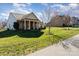 Lovely single-story home with well-maintained lawn and charming front porch at 7034 Pin Oaks Dr, Denver, NC 28037