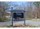 Pinehaven Village sign, highlighting a voluntary HOA community with a picturesque mountain backdrop at 752 Pinehaven Dr # 105, New London, NC 28127