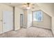 Bedroom featuring neutral carpet, ceiling fan, and natural light at 8005 Bridger Pt, Waxhaw, NC 28173