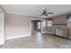 Spacious living room with decorative brick fireplace, tile floors and natural light at 825 Rock Grove Church Rd, Salisbury, NC 28146