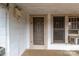 Covered porch with white siding, and a screened door at 825 Rock Grove Church Rd, Salisbury, NC 28146