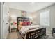 Cozy bedroom with bedside tables, soft lamps, and a large window for natural light at 9843 Quercus Ln, Huntersville, NC 28078