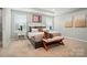 Bright bedroom featuring neutral colors, coordinated furnishings, and abundant natural light at 9930 Cask Way, Huntersville, NC 28078