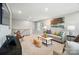 Upstairs living room with contemporary decor, plush seating, and abundant natural light at 9930 Cask Way, Huntersville, NC 28078