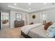 Main bedroom boasts a tray ceiling, walk-in closet, and access to an ensuite bathroom at 9930 Cask Way, Huntersville, NC 28078