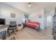 Cozy bedroom featuring a bed with an American flag pillow, a desk, and a comfortable chair at 1048 Harbor Bay Dr, Indian Land, SC 29707