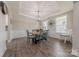 Well-lit dining room with decorative accents, a spacious table, and comfortable seating for gatherings at 1048 Harbor Bay Dr, Indian Land, SC 29707