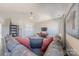 Relaxing living room featuring a comfortable gray sectional sofa and a television at 1048 Harbor Bay Dr, Indian Land, SC 29707