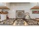 Close-up of a stainless steel gas stovetop with white subway tile backsplash and decor accents at 1048 Harbor Bay Dr, Indian Land, SC 29707