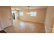 Bright dining room offering ample space for entertaining, enhanced by natural light from multiple windows at 1060 Laurel Ln, Gastonia, NC 28054