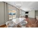 Modern dining area features contemporary light fixture and seamless access to the living room at 1100 Wallace Lake Rd, Fort Mill, SC 29707