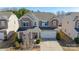 Beautiful two-story home with stone accents, manicured lawn, and a two-car garage at 1100 Wallace Lake Rd, Fort Mill, SC 29707