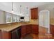 Kitchen showcasing granite countertops, stainless steel appliances, and hardwood flooring at 1100 Wallace Lake Rd, Fort Mill, SC 29707