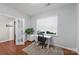 Bright home office features natural light, desk and chair, creating a functional and stylish workspace at 1100 Wallace Lake Rd, Fort Mill, SC 29707