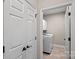 Convenient laundry room with a modern washer and dryer, ample storage, and easy accessibility at 114 Runningdeer Dr, Mooresville, NC 28117