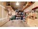 Garage with shelving for storage and exposed wall studs at 12031 Windy Rock Way # 1002, Charlotte, NC 28273