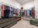 Well-organized walk-in closet with ample shelving and storage for clothes and accessories at 12234 Rowan Hill Dr, Huntersville, NC 28078