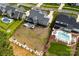 Overhead view of the property showcasing a large backyard, inground pool, and well-manicured landscaping at 13108 Brooklyn Skylar Way, Huntersville, NC 28078