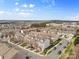 Community aerial view showcases townhomes, street parking and greenery at 14139 Winford Ln, Charlotte, NC 28262