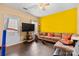 Bright living room featuring hardwood floors, a neutral color scheme, and sliding glass door at 14139 Winford Ln, Charlotte, NC 28262