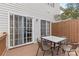 Outdoor patio area featuring wood flooring, furniture, and sliding glass doors for easy access at 14139 Winford Ln, Charlotte, NC 28262