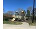 Community playground features slides, climbing structures, swings, and benches at 14139 Winford Ln, Charlotte, NC 28262