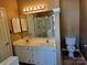 Bathroom with double vanity, shower with glass door, mirrors, and tile floors at 14922 Rolling Sky Dr, Charlotte, NC 28273