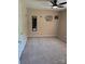 A simple bedroom with carpet and decorations on the walls at 14922 Rolling Sky Dr, Charlotte, NC 28273