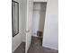This is a view into a closet with carpet, shelving, and a white door at 14922 Rolling Sky Dr, Charlotte, NC 28273