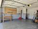 A spacious garage with epoxy floors and plenty of storage space at 14922 Rolling Sky Dr, Charlotte, NC 28273