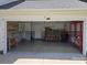 A spacious garage with epoxy floors and plenty of storage space at 14922 Rolling Sky Dr, Charlotte, NC 28273