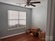 Bedroom with natural light from the window and wood flooring at 1509 Tiana Way, Rock Hill, SC 29732