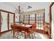 Cozy breakfast nook with natural light, wood floors, and rustic chandelier at 1531 Wheaton Nw Way, Concord, NC 28027