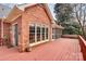 Large wooden deck with a view of the backyard at 1531 Wheaton Nw Way, Concord, NC 28027