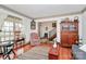 Cozy living room with hardwood floors, neutral paint, and plenty of natural light at 1531 Wheaton Nw Way, Concord, NC 28027