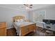 Bedroom with a queen-sized bed, matching nightstand and dresser, and a window with blinds at 18334 Dembridge Dr, Davidson, NC 28036