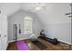 Bonus room with arched window, exercise ball, yoga mat, and a rowing machine at 18334 Dembridge Dr, Davidson, NC 28036