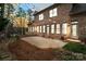 Brick patio and string lights illuminate this lovely backyard space at 1838 Landry Ln, Rock Hill, SC 29732