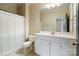 Bathroom featuring a white vanity with sink, toilet, and walk-in shower at 1838 Landry Ln, Rock Hill, SC 29732