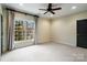 Spacious bedroom with neutral walls, carpet, and a large window at 1838 Landry Ln, Rock Hill, SC 29732