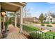 Inviting front porch with brick flooring and wrought iron railing at 1838 Landry Ln, Rock Hill, SC 29732