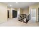 Upstairs hallway with neutral carpet, iron railing and many rooms branching off at 1838 Landry Ln, Rock Hill, SC 29732