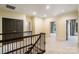 Open hallway with staircase, neutral carpet and black doors at 1838 Landry Ln, Rock Hill, SC 29732