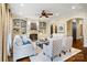 Inviting living room featuring a fireplace, built-in shelving, and plush seating arrangement at 1838 Landry Ln, Rock Hill, SC 29732