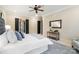 Bright main bedroom featuring soft rug, ceiling fan and neutral decor at 1838 Landry Ln, Rock Hill, SC 29732